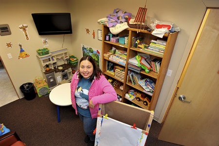 Suquamish Safe Havens case aide Jennifer Agibinik in one of the Safe Havens visitation rooms.