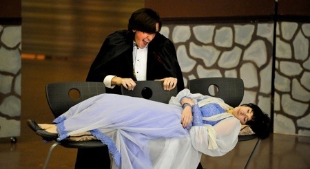 Connor Delaney (Count Dracula) and Stephanie Lee (Lucy) rehearse a scene Tuesday in preparation for the upcoming Kingston High School production of 'Dracula'.