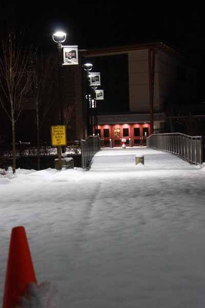 The bridge to Kingston High School was covered with about three inches of snow early Wednesday morning after the storm which resulted in school cancellations across Kitsap County.