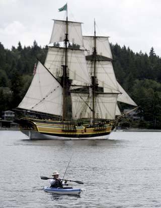 A kayaker got an up-close view of the Lady Washington Monday afternoon as it sailed through Port Orchard Bay toward the Port of Brownsville.