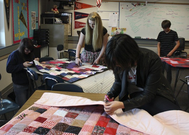 Students in the leadership classes at  Mountain View Middle School worked recently on quilts to be donated to local citizens in need. The students say they find a sense of community in helping others while finding a sense of pride in themselves.