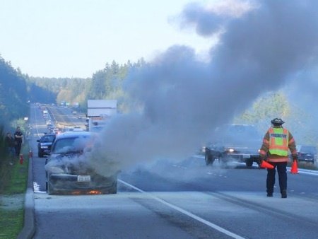 A PT Cruiser caught fire on Highway 3 Thursday afternoon