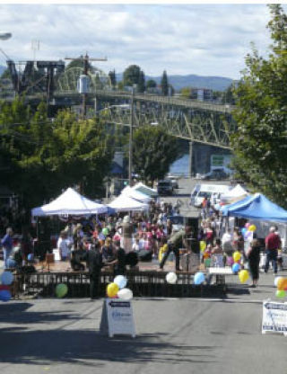 The Manette Bridge rises above last year’s Manette Fest. Festivities include food