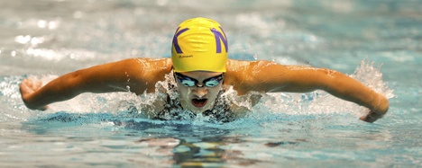 North Kitsap High School sophomore Bethany Aban swims the 100-yard butterfly at the 3A girls state swim meet Friday. Aban placed 15th in the butterfly and 10th in the 100-yard breaststroke. She will compete in the finals for both events Saturday.