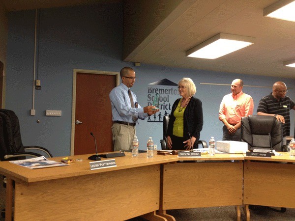 Flip Herndon accepts an award from Bremerton BoE.