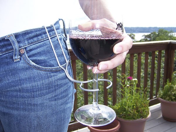 The Hip Sip is a wine glass holder that slips over a belt on your hip and holds your wine glass in place