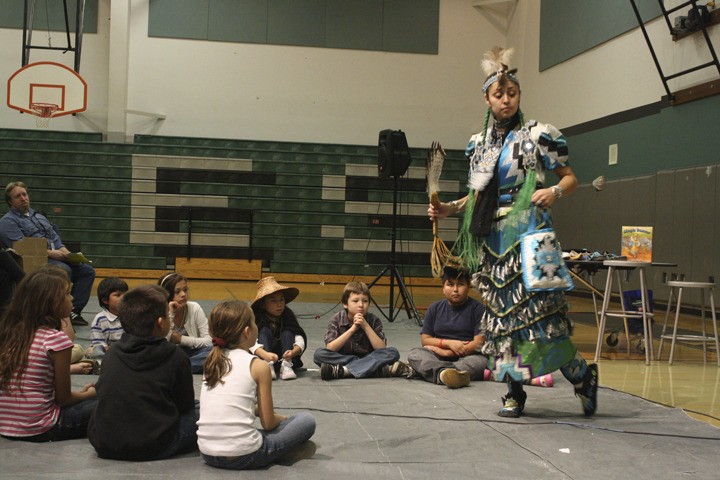 Angelia Nockai performs a jingle dance Thursday at Klahowya Secondary School for Central Kitsap School District's Native American Culture Night.