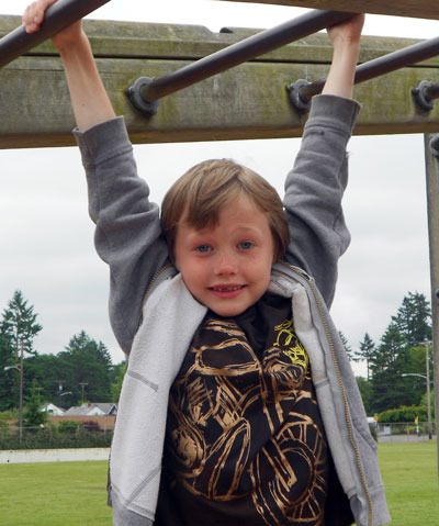 Aden Powers enjoys the playground at a local YMCA.