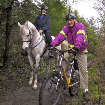 Rod and Kelly Tyler using one of the trail systems the North Kitsap Trails Association is trying to expand and improve.