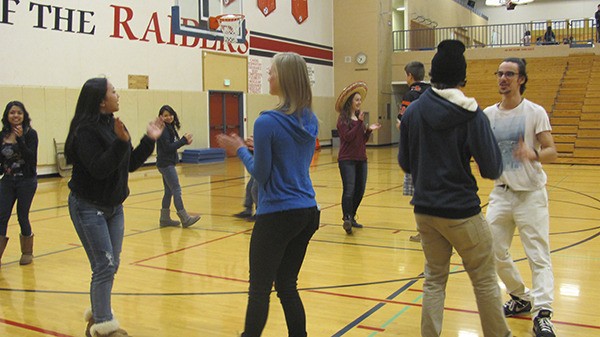 Students perform a Spanish dance at the language fa