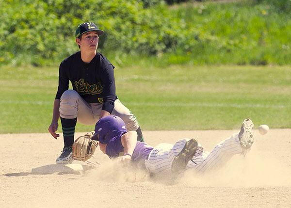 North Kitsap’s Tyler Trainer beats the ball to second base vs. Lynden