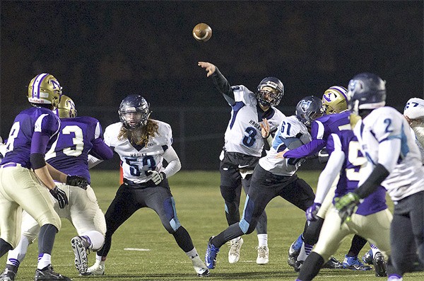 Hockinson quarterback Mitch Lines throws the football down field during the 2A State game against the North Kitsap Vikings Nov. 15 at North Kitsap Stadium. Hockinson won 7-2 in the first round of the State playoffs.