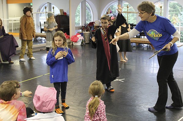 Sue Pargman selects a student to perform during a recent class in Poulsbo. The class meets weekly helping students to be confident and articulate through creative drama exercises.