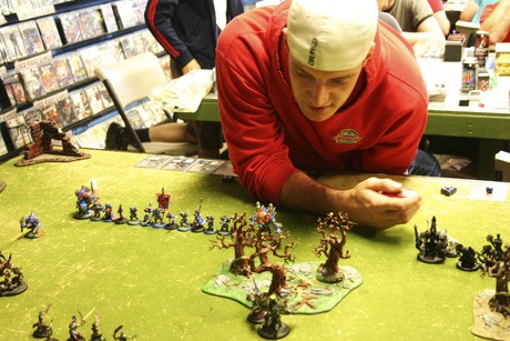 A player thinks over strategy during a game at Gryphon Gaming in Poulsbo.