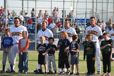 Members of North Perry Little League and other young players joined the BlueJackets on the field prior to the team's 2009 home-opener at Lobe Field at the Kitsap County Fairgrounds. The Bend Elks defeated Kitsap