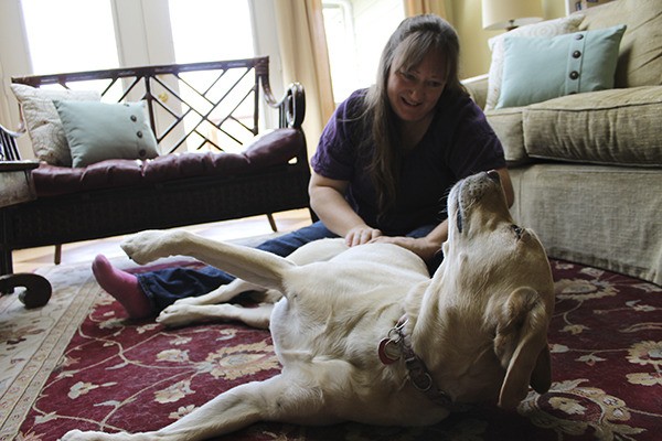 Sandy Armstrong massages Abby