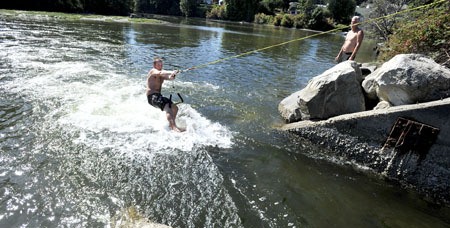 Kolby Waggoner slices through tidewater at Arness Slough.