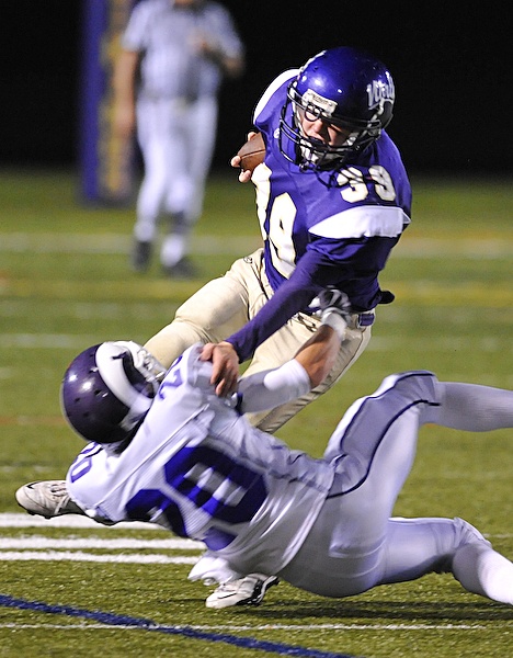 North Kitsap Vikings running back Jon Hawkins clears the North Thurston line during home action Friday at North Kitsap Stadium. Check back here later for the full game story.