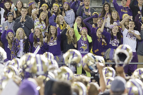 The crowd cheers for the North Kitsap Vikings following their 33-13 homecoming victory over the Sequim Wolves Sept. 26 at North Kitsap Stadium.