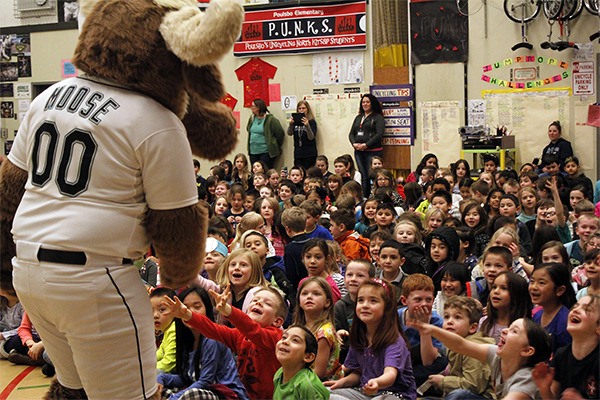 The Mariner Moose is greeted by fans at Poulsbo Elementary School
