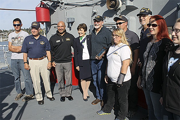 Past and current employees at the USS Turner Joy were on hand to honor former director Jack James in Bremerton on Sept. 29. Those attending include