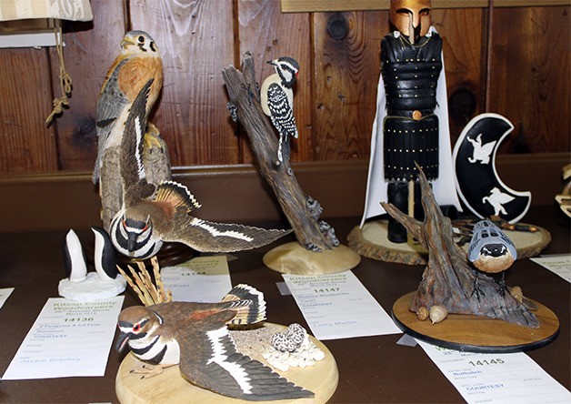 Lifelike birds sit on display at the 28th annual Kitsap  Woodcarvers Show. The juried show hosted 130 different woodcarvings for judging and public viewing.