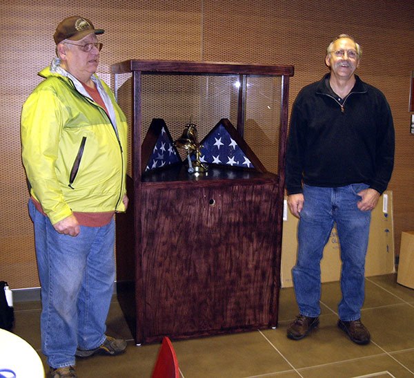 Don Hixon and Jack Campbell delivered the veterans memorial kiosk that was made from materials donated by Lowe’s in Silverdale and Auto Glass Plus on Auto Center Way. The county has rejected it