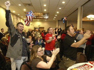 People in attendance at the Democratic election party at the Silverdale Beach Hotel rejoice after Barack Obama was named the projected winner Tuesday night.