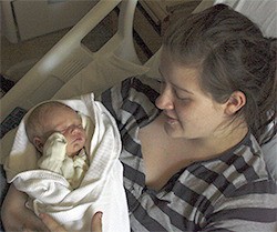 Trenidy Hedrick holds her son James at Harrison Medical Center in Silverdale.