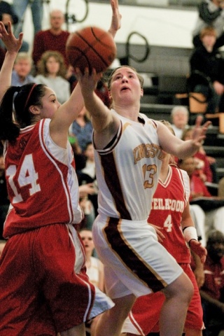 Kingston HIgh sophomore Sophia Baetz drives in for a shot Tuesday night during the Bucs' 51-37 victory ove Steilacoom.