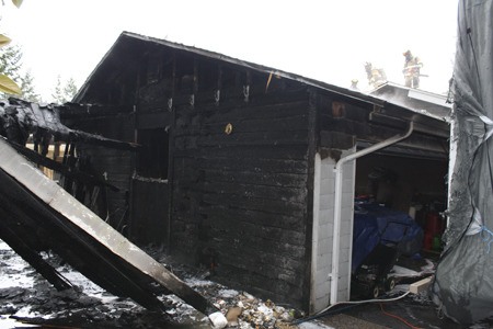After dousing a garage fire at a Silverdale house Friday afternoon