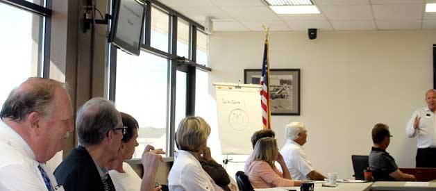 Cary Bozeman speaks to a group of public sector planning professionals about upcoming opportunities in Bremerton.