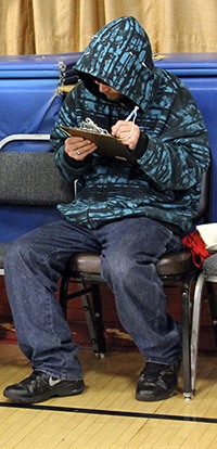 A Project Connect attendee fills out paperwork at the Sheridan Park Community Center in Bremerton on Wednesday.