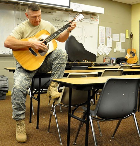 Todd Hall plays for students.