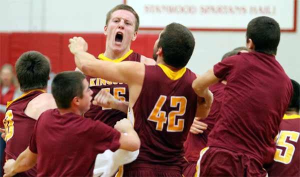 Kingston's Sam Byers lets out a yell following a 74-73 win over the Cedarcrest Red Wolves Friday night during the 2A Regional tournament at Stanwood High School. The Kingston Buccaneers boys basketball team is headed to the Hardwood Classic for a shot at the 2A State title.