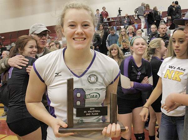 North Kitsap's Sarah Holt holds the Vikings' second place 2A State Championship trophy after the final match against Tumwater Nov. 15.