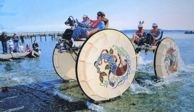The Spirit of Muckle Flugga emerges from the sea during a kinetic sculpture race.