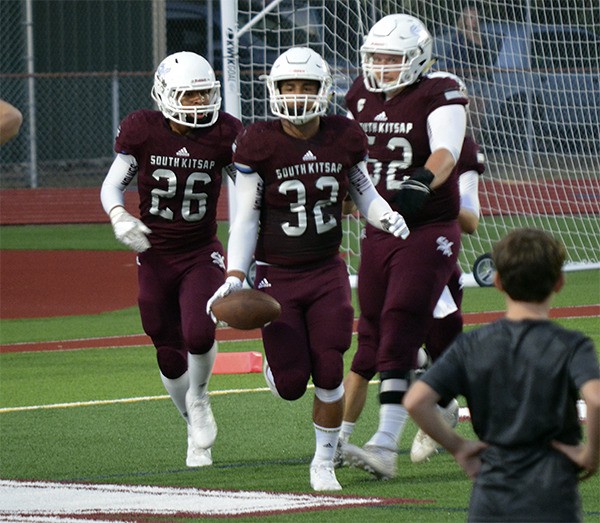 The Wolves celebrate a touchdown during their game against Sumner Sept. 9 at Kitsap Bank Stadium.