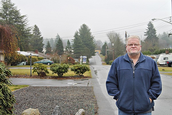 Vern LaPrath stands in front of his house on Hanford Avenue in East Bremerton. He has been campaigning for speed bumps for years.