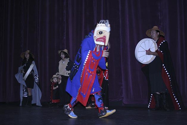 Members of the Haida Heritage Foundation prepare for a traditional song and dance performance during Native American Culture night at Klahowya Secondary School.