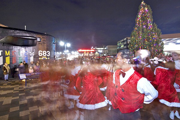 Dancers  perform during Bremerton’s Winterfest on Dec. 5 in the Harborside area of downtown. Behind them is the city’s Christmas tree which was lit by Mayor Patty Lent during the festivities. Santa also made an appearance.