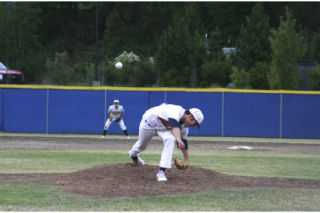 Kitsap BlueJackets pitcher Steven Singer follows through on a pitch during the Jackets’ 3-0 loss to Corvallis at home Tuesday. Singer pitched seven innings