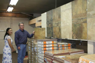 Wholesale Flooring Source general manager Dave Heeter and sales associate Carolyn McBride sell flooring