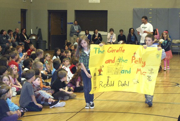 Students at Woodlands Elementary in Bremerton show off their work at the school's 27th Annual Book Float Parade. The event brings students together to create floats designed around their favorite books and to have fun with literacy.