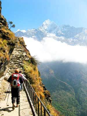 A precarious section of the trail with Nuptse in the background.