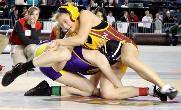 Kingston’s Peyton Reece finished second to Puyallup’s Jordyn Bartelson in the 2014 Mat Classic. She is undefeated in regular- and post-season