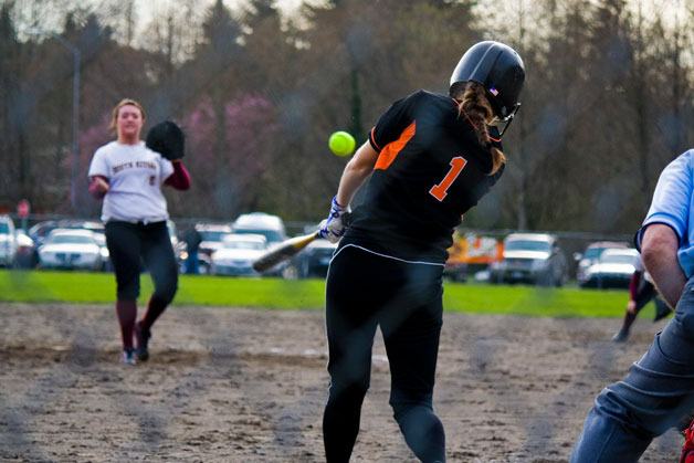 Central Kitsap starting pitcher Caylee Coulter gets a piece of the ball in the sixth inning. It was one of only two hits the Cougars recorded on Tuesday against South Kitsap in a 9-0 defeat.