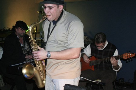 Musician 2nd Class Jay Gillespie of Navy Band Northwest performs a guest rendition of “Mercy