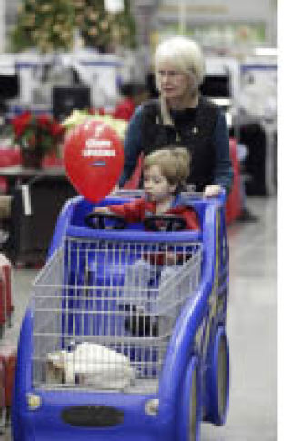 Maxine Ramey of Poulsbo checks out the new Lowe’s in Silverdale with her grandson Evan Clayton