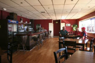 Bremerton Eagles members enjoy the renovated upstairs bar at the organization’s facility in downtown Bremerton. Eagles members spent two years remodeling the upstairs bar